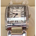 New old stock boxed ladies Dreyfuss and Co stainless steel wristwatch with diamand set bezel and