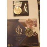 Cased Diamond Jubilee 5 pound coin and a further five pound coin