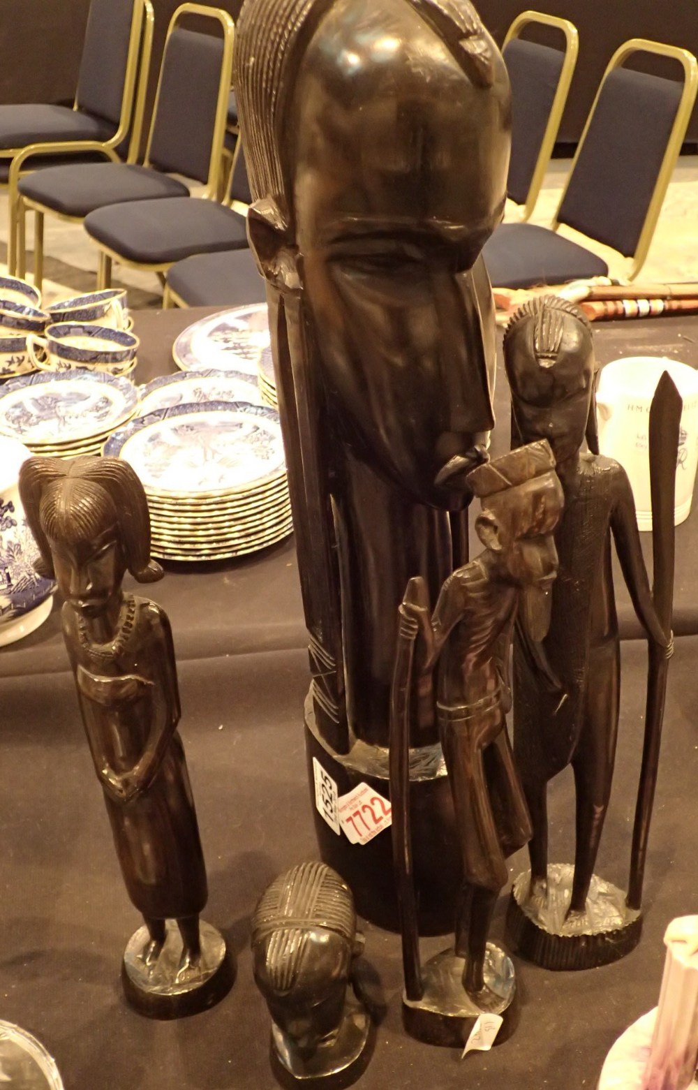 Five ebonised carved African figurines tallest H: 45 cm