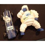 Cast iron Michelin Man in racing car L: 27 cm and Cast iron Michelin Man standing H: 24 cm