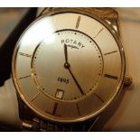 Boxed new old stock gents gold tone Rotary wristwatch with date and matching strap