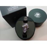 Ladies Citizen Ecodrive wristwatch with unusual pendant attachments on stainless steel strap