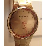 New old stock boxed ladies gold tone Skagen wristwatch with matching strap CONDITION