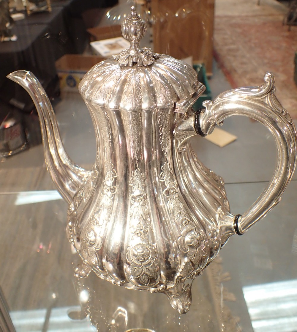 Antique silver plated coffee pot with floral decoration 25 cm