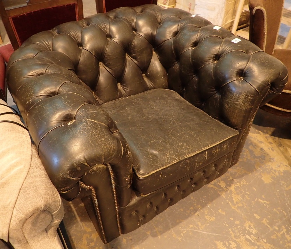 Dark green leather button back Chesterfield armchair