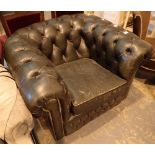 Dark green leather button back Chesterfield armchair