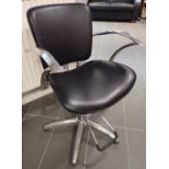 Rise and fall barbers chair in chrome and faux leather