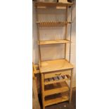 Boxed free standing pine kitchen unit with three shelves and drawers with wine rack