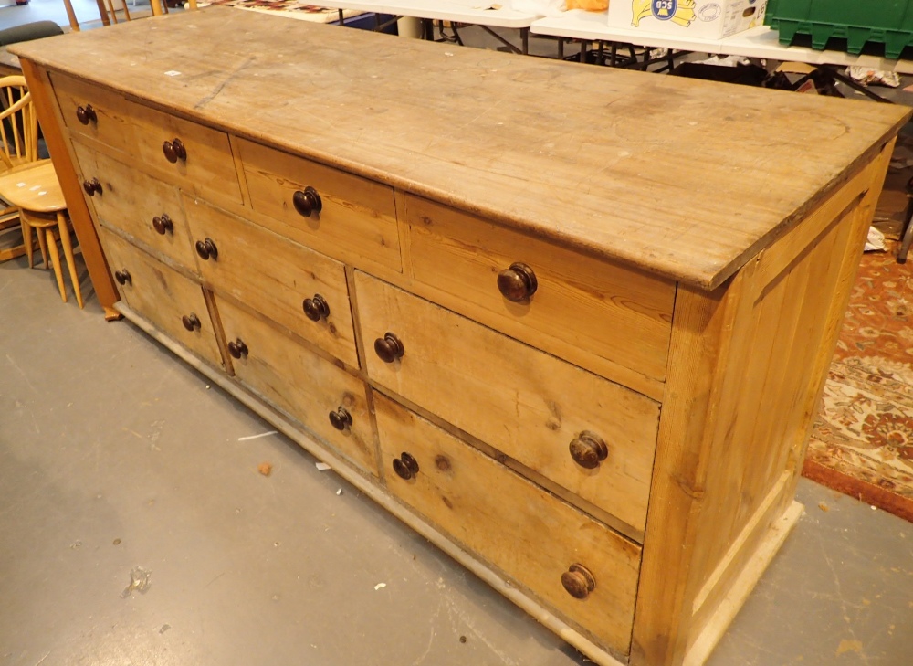 Large pine dresser base of ten drawers 220 x 71 x 99 cm H