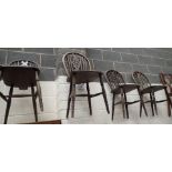 Four oak wheelback chairs