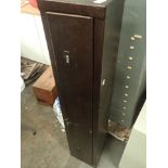 Modern gun cabinet with key for top lock