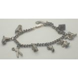 Silver charm bracelet with ten charms an