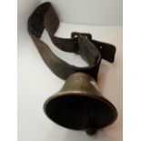 Victorian brass cow bell on leather bolt