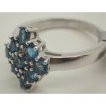 925 sterling rhodium plated blue stone set cluster ring size U