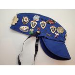 Blue cap with Russian related badges
