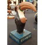 Cast iron toucan marked Guinness