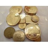 Box of yellow metal reproduction coins