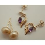 Two pairs of 14ct gold earrings one amethyst drops and one genuine pearl studs