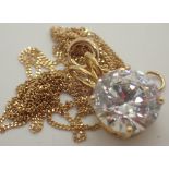 18ct gold cubic zirconia pendant approximately 2ct on a fine 18ct gold chain