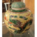 Japanese lidded ceramic vase decorated with five toed imperial dragons on yellow ground H: 14 cm