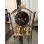 Schatz brass cased anniversary clock CONDITION REPORT: The pendulum suspension is