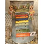 Blow football wooden goal with two players and a vintage xylophone