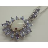 10K white opal and tanzanite pendant on 9ct white gold necklace