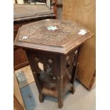 Heavily carved and mother of pearl inlaid Indian table H: 56 cm