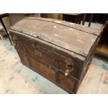 Large antique dome top canvas and wood bound luggage trunk with original Collins and Graham of