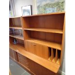 1970s Clausen and Son Danish teak wall unit with three central drawers and two sliding cupboards