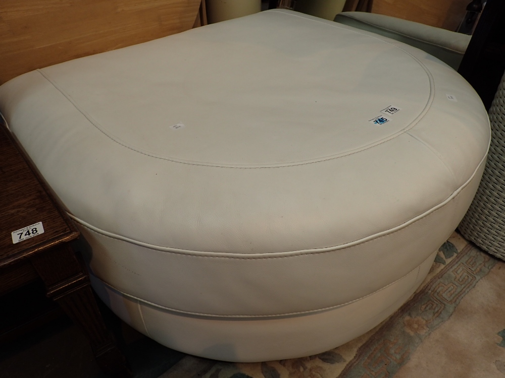 Large white leather pouffe
