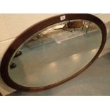 Large oval mahogany mirror with bevelled