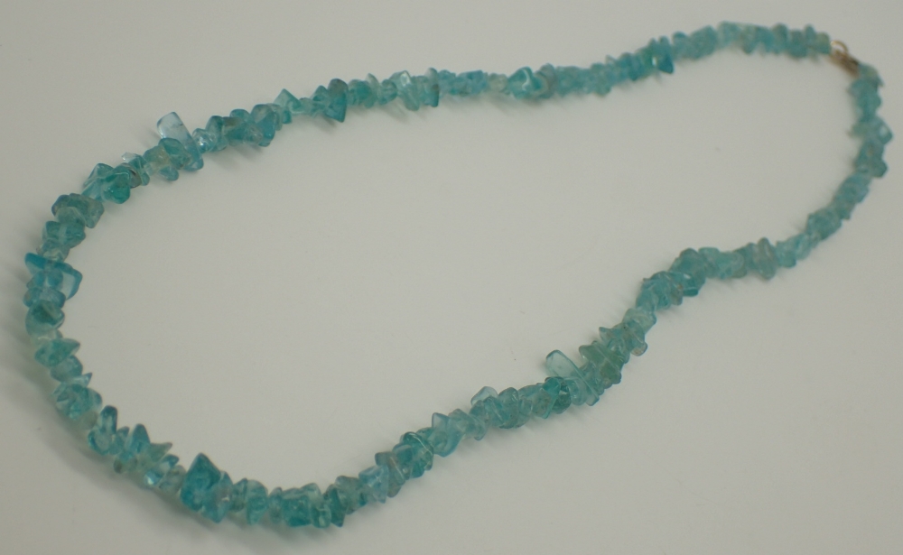 Raw blue topaz stone necklace with 9ct g