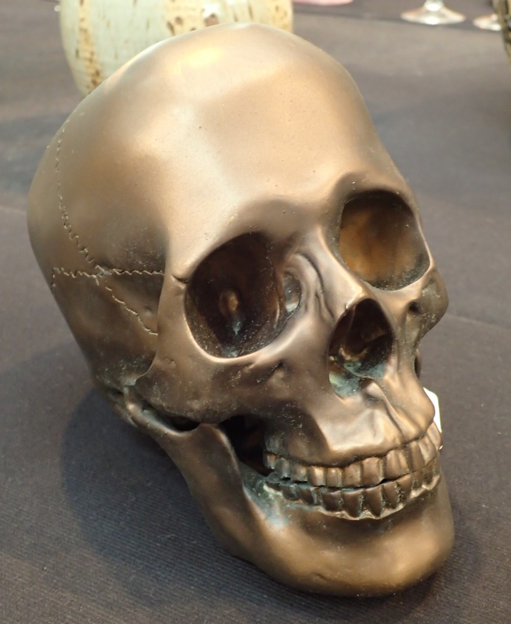 Bronze colour resin skull H: 17 cm