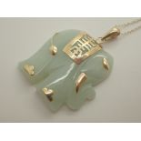 White jade carved elephant pendant with