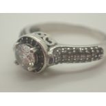 Silver solitaire ring stamped 925 size O