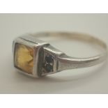 9ct gold and silver ring with yellow sto