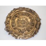 Hindu brass religious circular platter with animals and gods CONDITION REPORT: Good