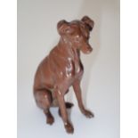 Late 19thC Australian cold painted bronze figurine of a seated greyhound base stamped SCH W