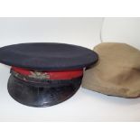 Vintage peaked military cap with Earl of Chesters IY badge and cover