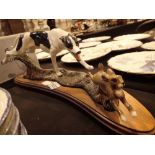 Ceramic greyhound and hare tableau on a wooden base unnamed