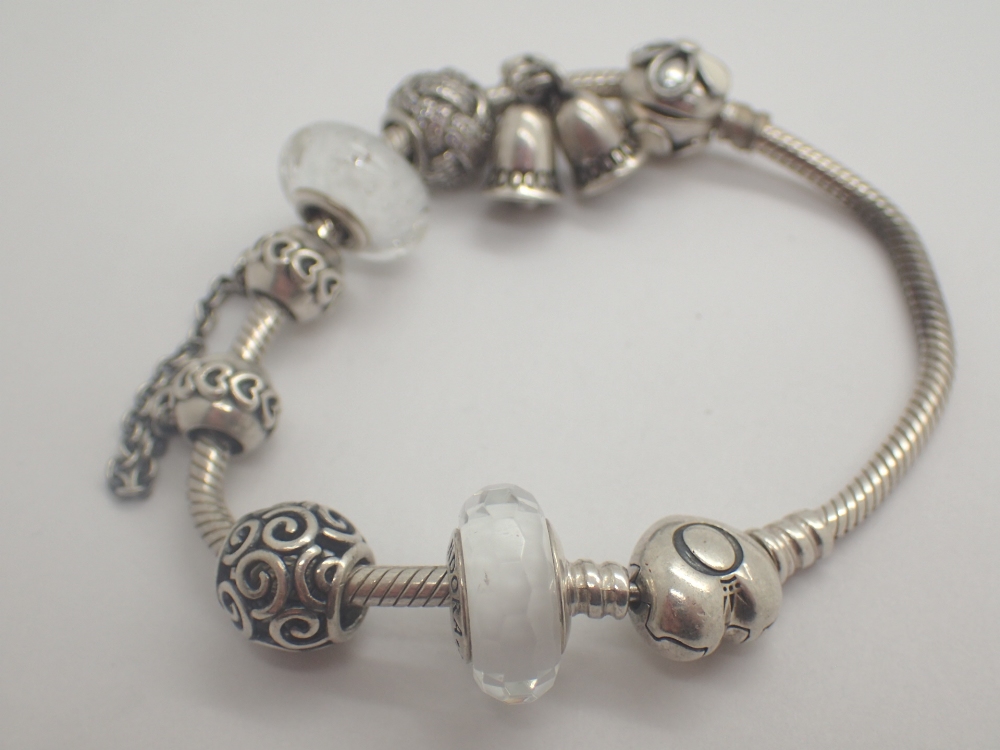 Sterling silver Pandora bracelet with seven charms