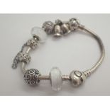 Sterling silver Pandora bracelet with seven charms