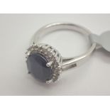 Gemporia silver large sapphire and cubic zirconia Princess Diana ring approximately 3.