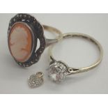 Two 9ct gold rings including cameo example and a small heart shaped pendant