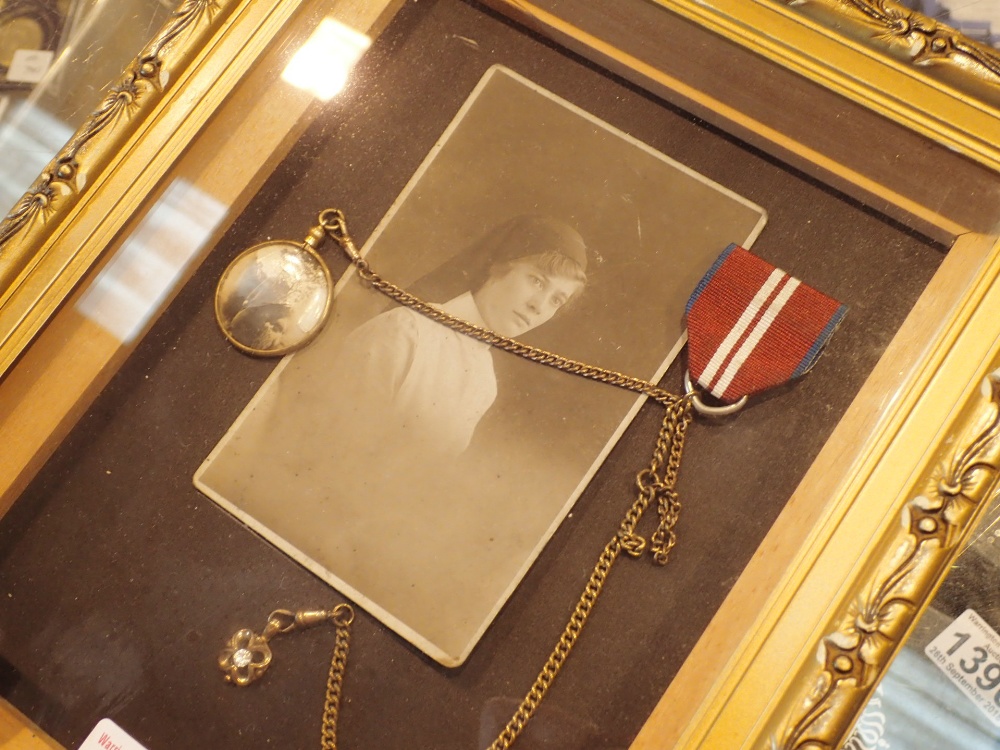 Framed WWI framed nursing photograph and medal with double chain