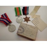 Three WWII medals in box of issue to 1264947 Corporal Stratton