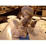 Lladro girl with puppy figurine