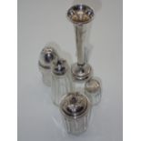Five items of silver including four cruets and small bud vase