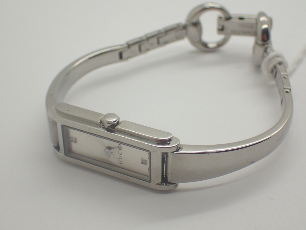 Genuine Gucci bangle watch with diamond dial and full length bracelet CONDITION REPORT: